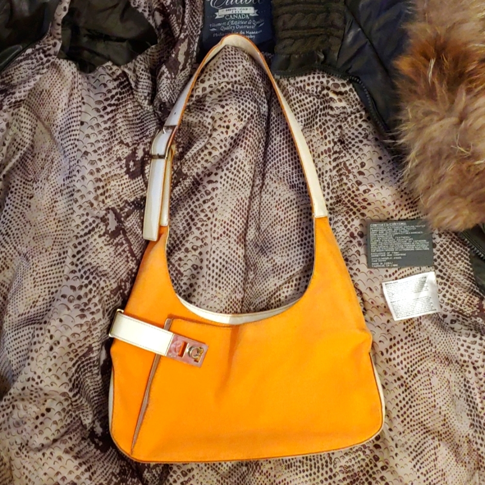 Ferragamo Small used orange but quite discolored authentic handbag